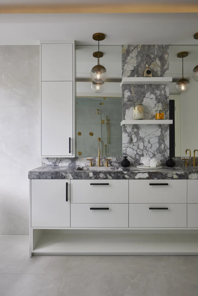 High-end modern bathroom with marble finishes.‎