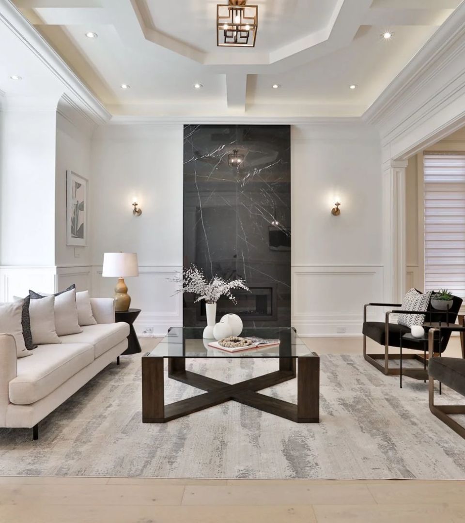 Elegant living room with a feature fireplace.‎