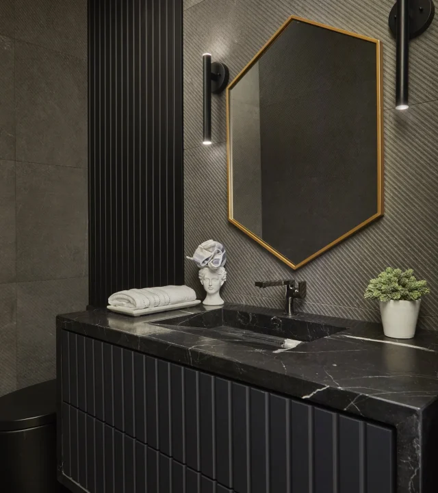 Modern powder room with clean finishes.‎