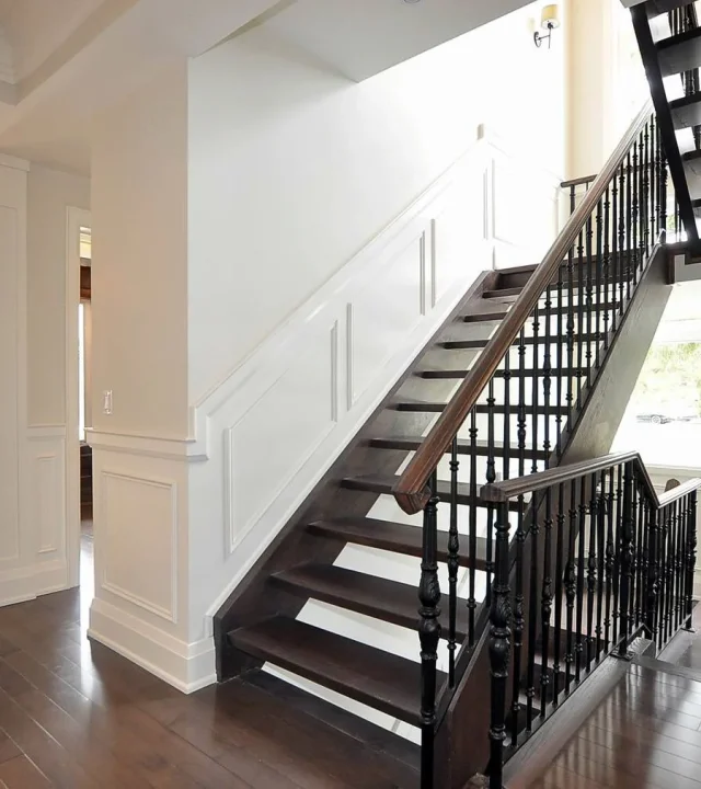Bright entryway with premium flooring and statement lighting.‎
